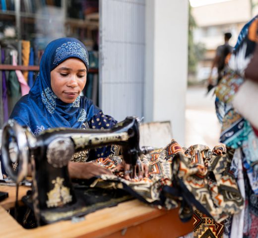 muslim-african-woman-sewing-using-sewing-machine-2024-07-30-20-07-41-utc